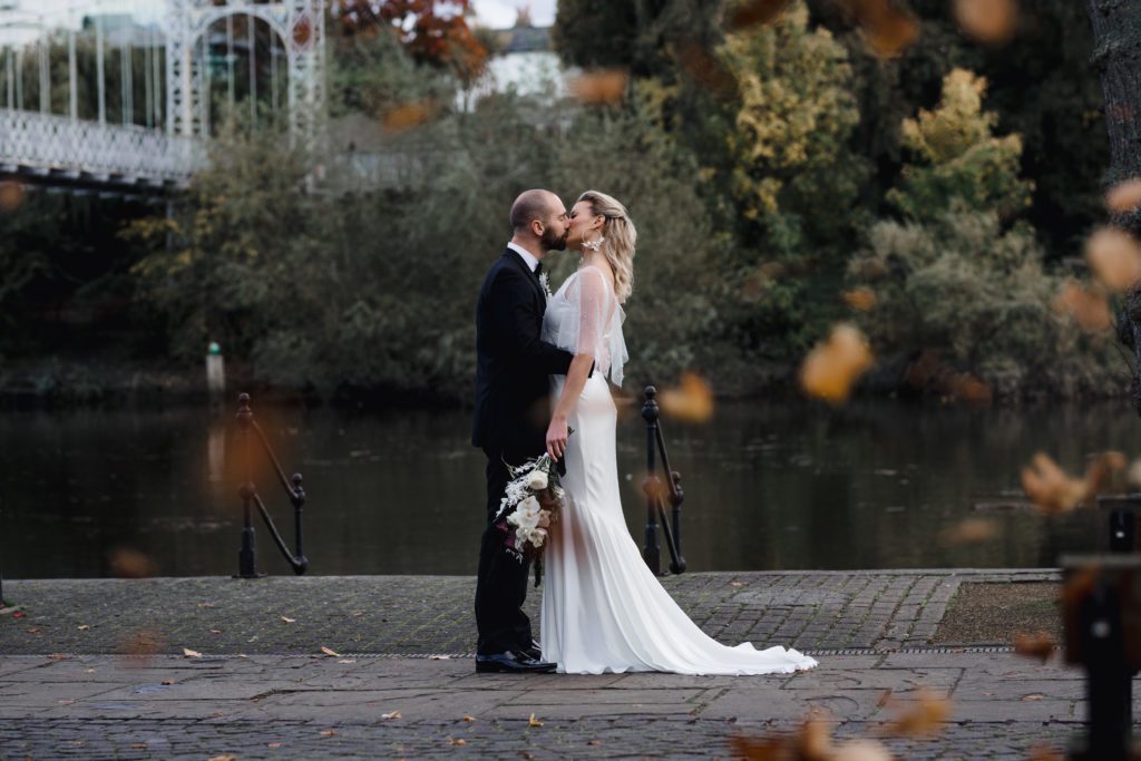 Autumn wedding showing bride and groom outdoors